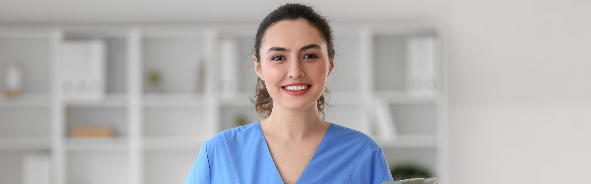 Young gorgeous professional nurse smiling